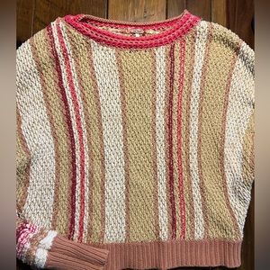 Cozy, cropped Free People sweater.